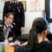 Nella foto una carabiniera che consolano una donna