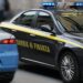 Le auto della Polizia e della Guardia di finanza