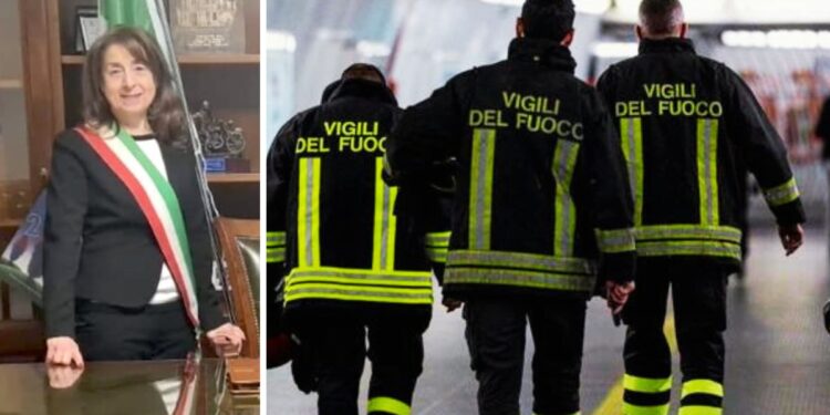 Un gruppo di vigili del fuoco e la sindaca di Filadelfia, Anna Bartucca
