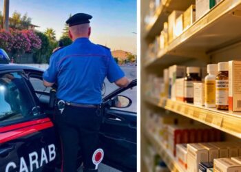 Un militare dell'arma dei carabinieri e dei farmaci su uno scaffale
