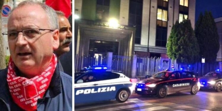 Il segretario generale della Cgil Area Vasta Enzo Scalese e auto di polizia e carabinieri