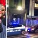 Il segretario generale della Cgil Area Vasta Enzo Scalese e auto di polizia e carabinieri